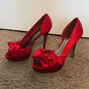 Aldo red heels with bows
